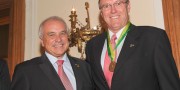 Aaron Sher received the Award from FIH President Leandro Negre