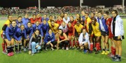 Guyana players pose with Argentina after their match at the 2013 Pan American Cup in Mendoza