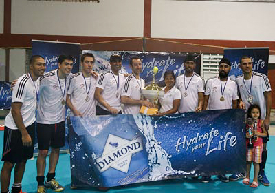 Canada’s Revamp men’s team show off their first place trophy for the just concluded GHB/Diamond Mineral Water Int’l Indoor Hockey festival